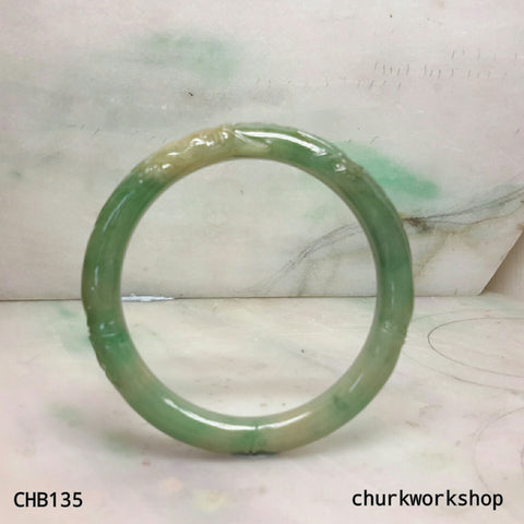 Small carved green jade bangle