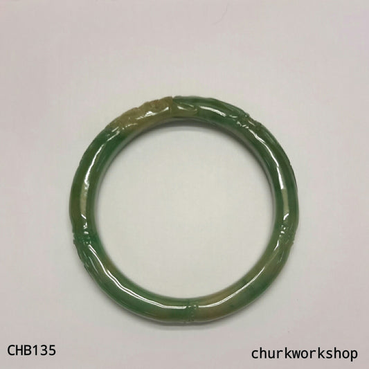 Small carved green jade bangle