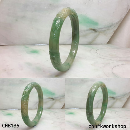 Small carved green jade bangle