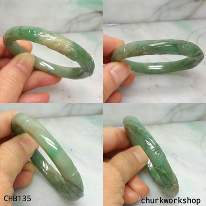 Small carved green jade bangle