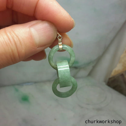 Triple ring pale green jade pendant