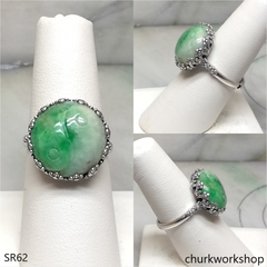 White with splotches green jade ring