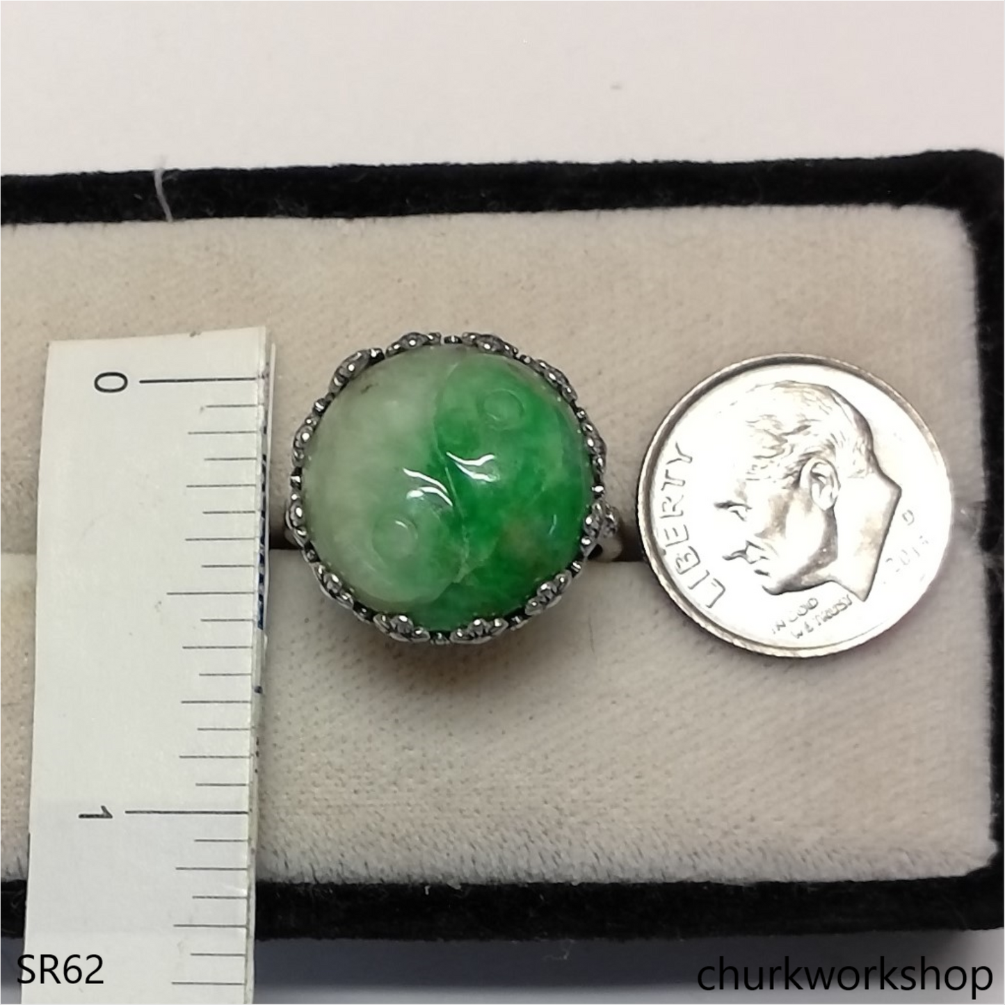 White with splotches green jade ring