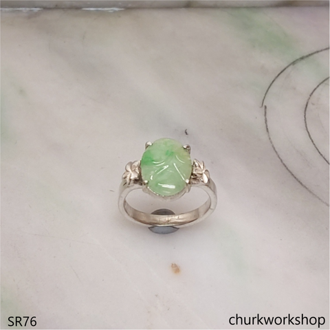 Light green carved jade ring