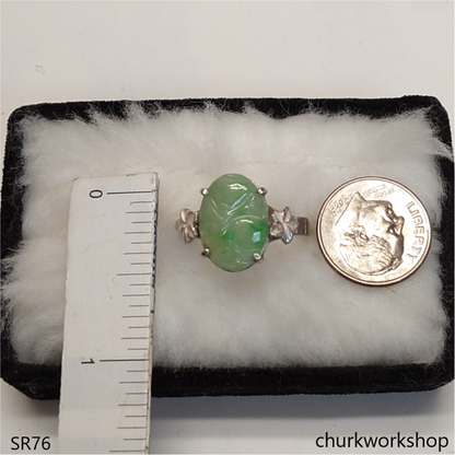 Light green carved jade ring