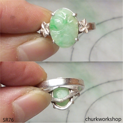 Light green carved jade ring