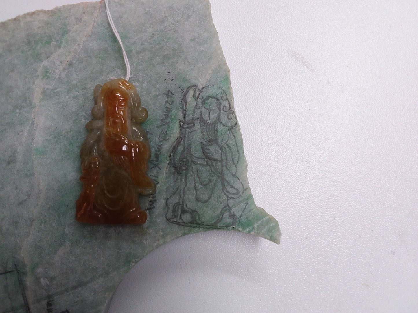 Green jade Guan Gong pendant