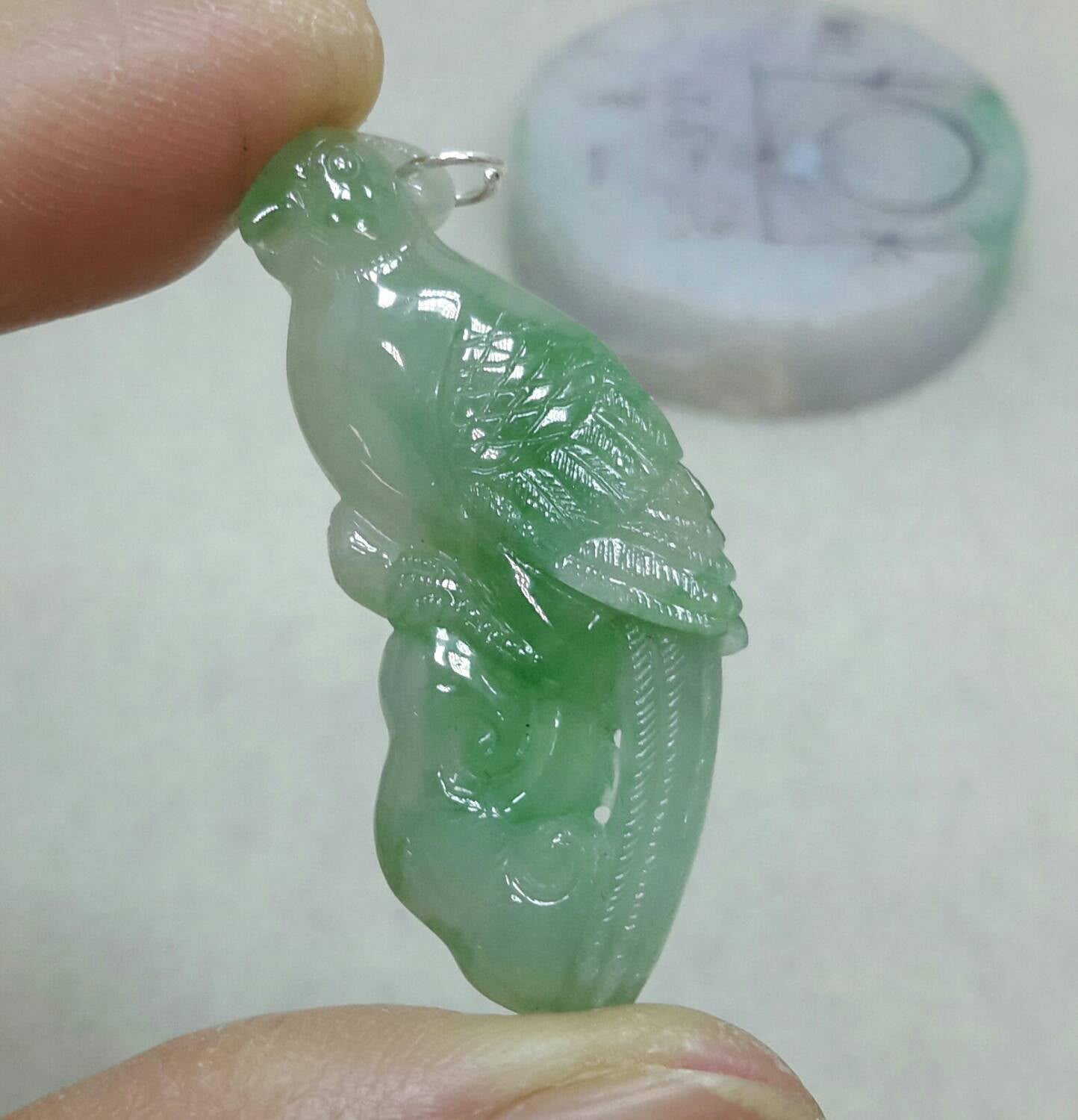 Green jadeite parrot pendant