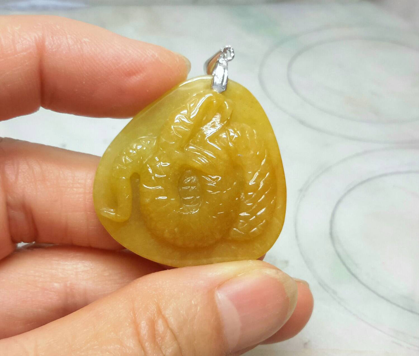 Red jade snake pendant